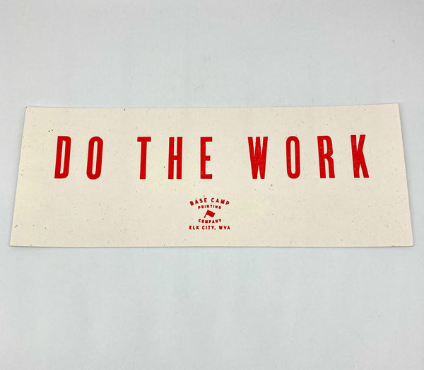 A small banner print on a white background reads "Do the work" in red printed block letters.